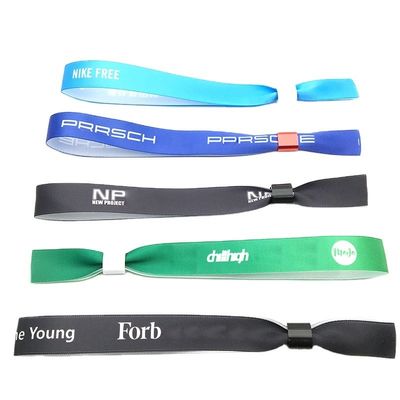 Pulseras de tela de satén con chip RFID personalizadas en amarillo para la gestión de fiestas y eventos