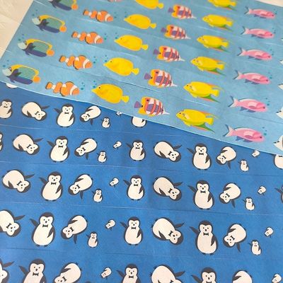 Brazaletes de papel Tyvek para diseño personalizado Stock de dinosaurios Conejos globos y más