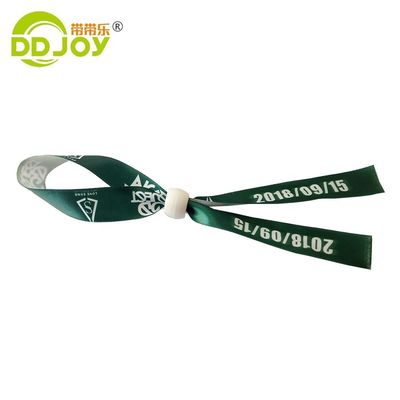 Pulseras RFID impresas a medida en tejido naranja de satén para la marca y el acceso al evento