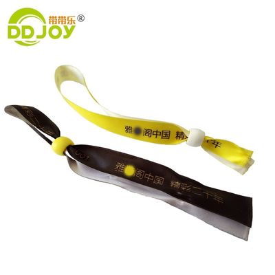 Pulseras RFID impresas a medida en tejido naranja de satén para la marca y el acceso al evento
